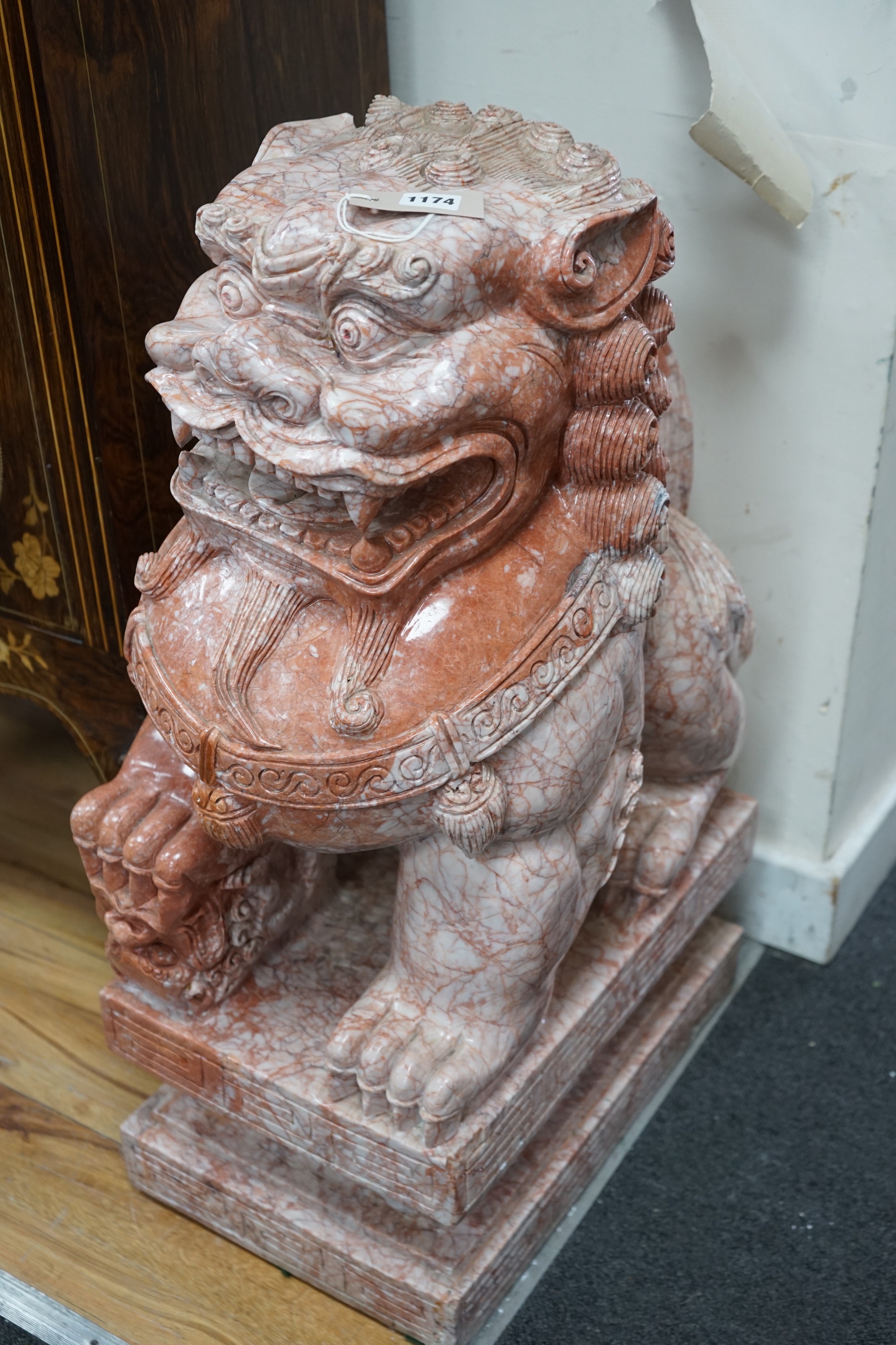 A Chinese carved marble dog of Fo, width 29cm, depth 45cm, height 78cm